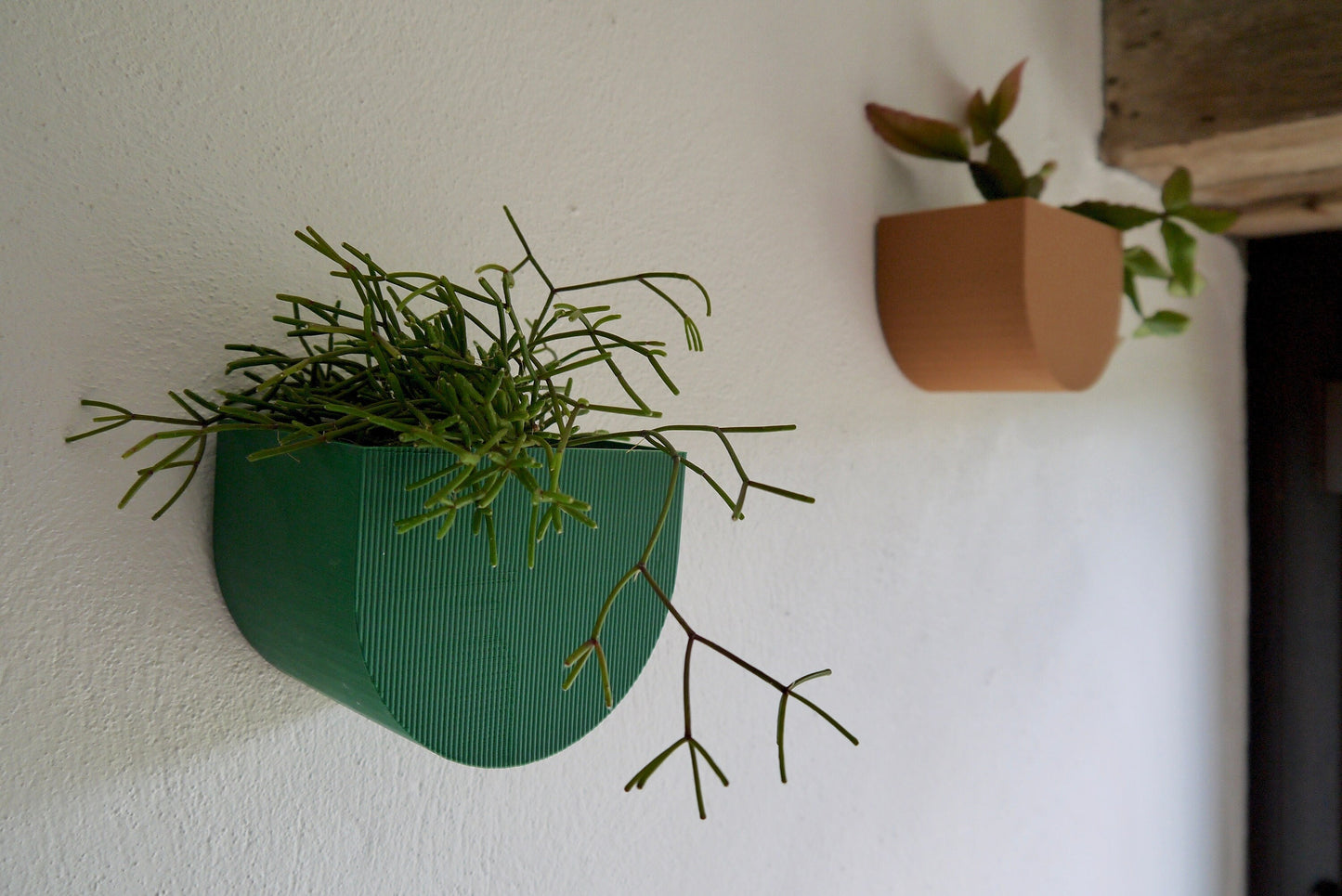 British racing green and brown wall mounted plant pots